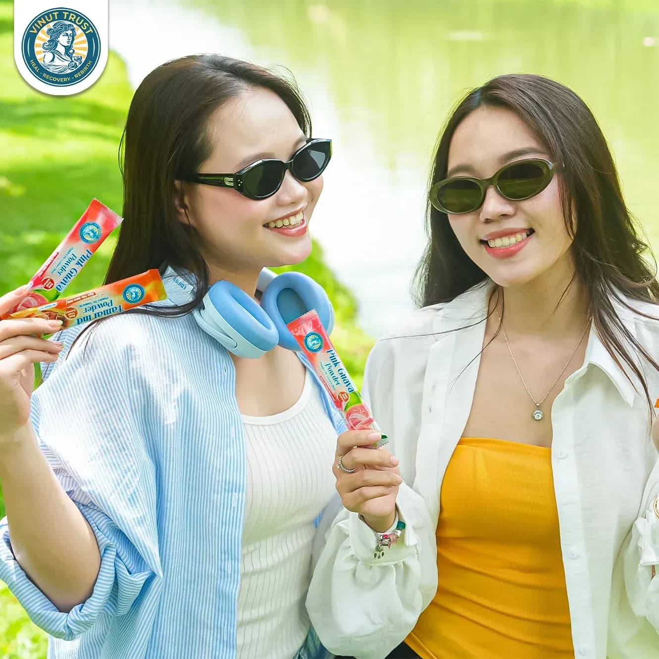 Two friends enjoying fruit drinks together
